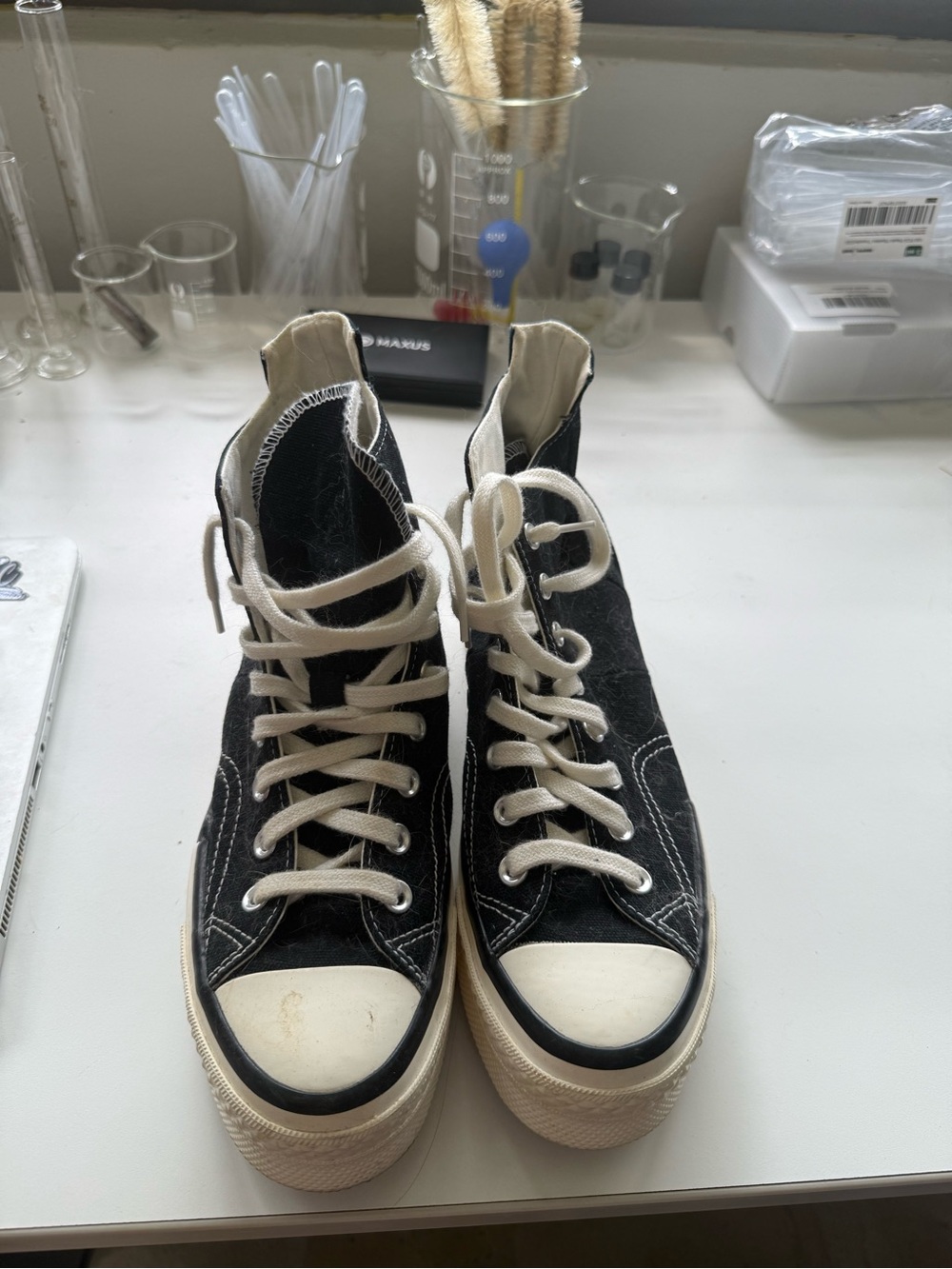 Converse Black and Cream High-Top Chuck Taylor Sneakers